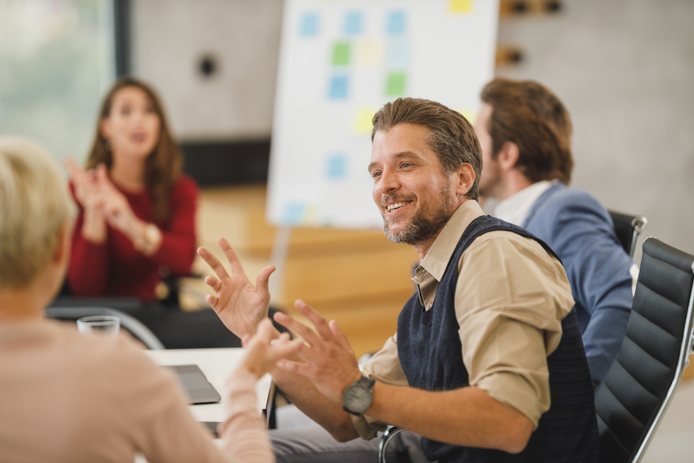 Business meeting with technology professionals